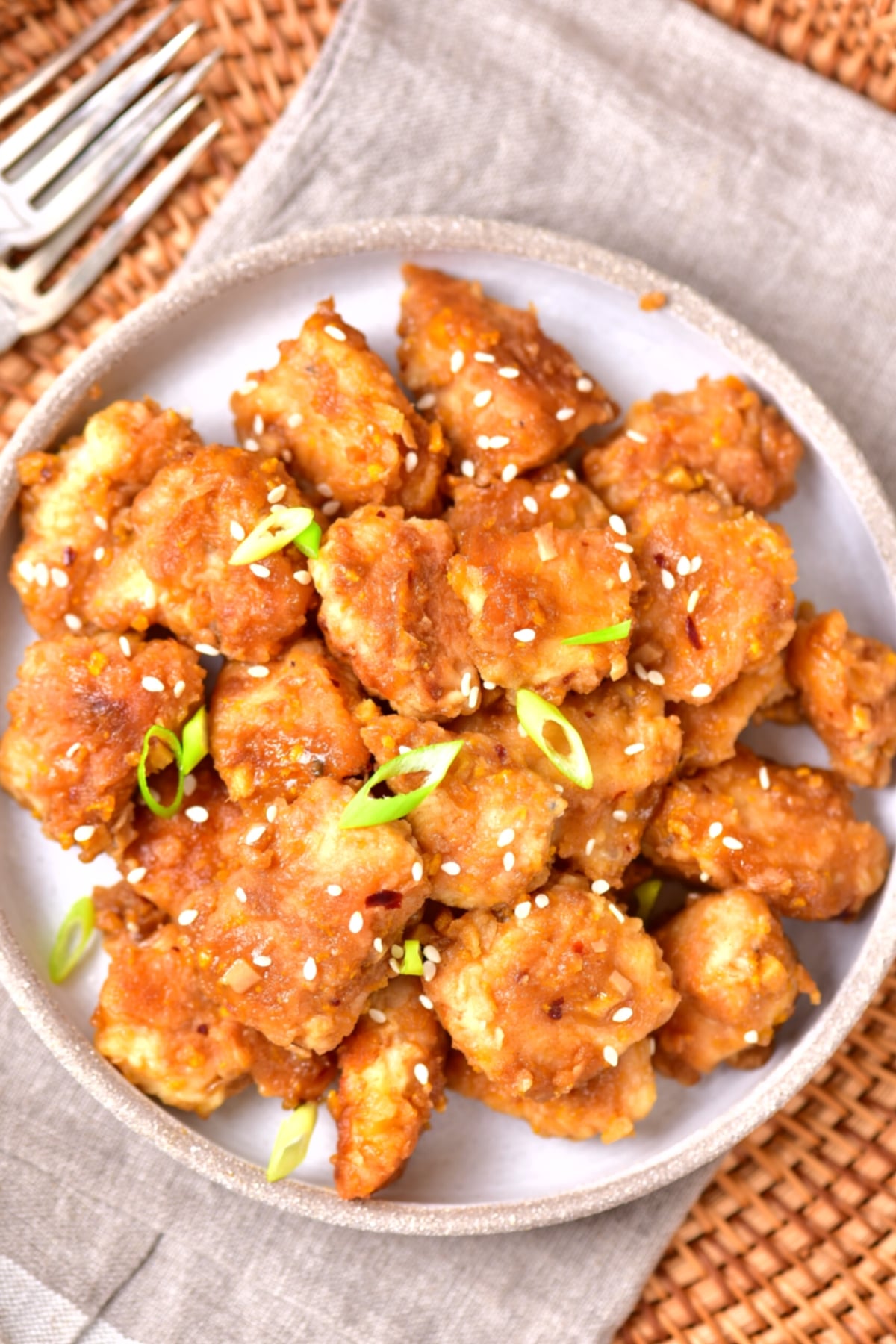 GF Orange Chicken Recipe Top down view of orange chicken on a plate.