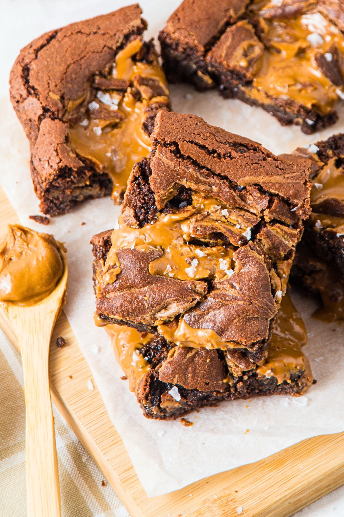 Peanut butter chocolate brownies on parchment paper.