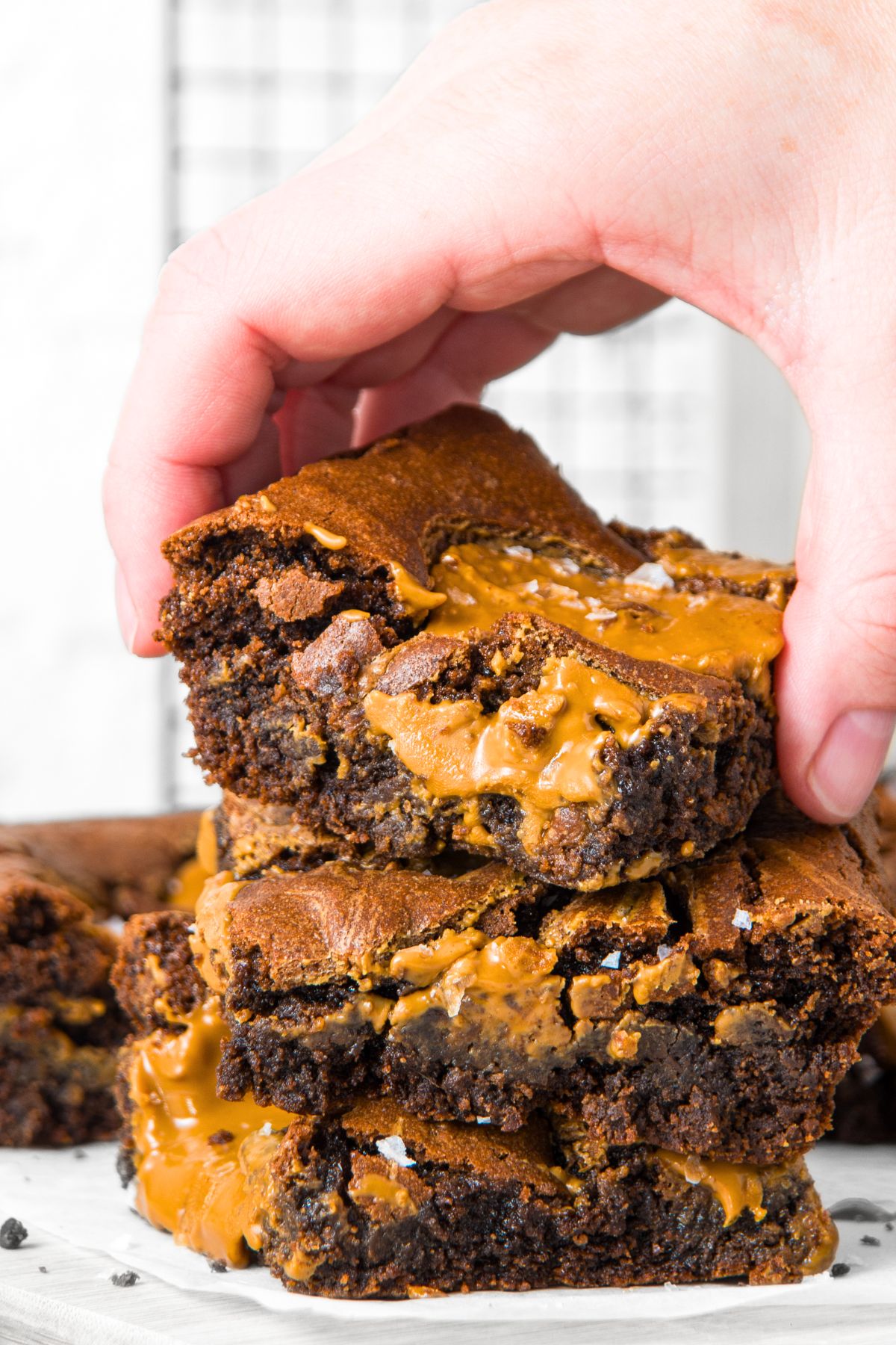 Picking up a gluten-free peanut butter brownie.