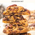 A stack of pecan and chocolate chip cookies