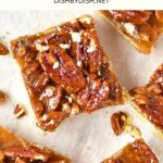 Top down view of gluten-free pecan pie bars on parchment paper.