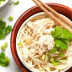 Up close view of a bowl of chicken pho