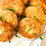 Many potato cakes on plate.