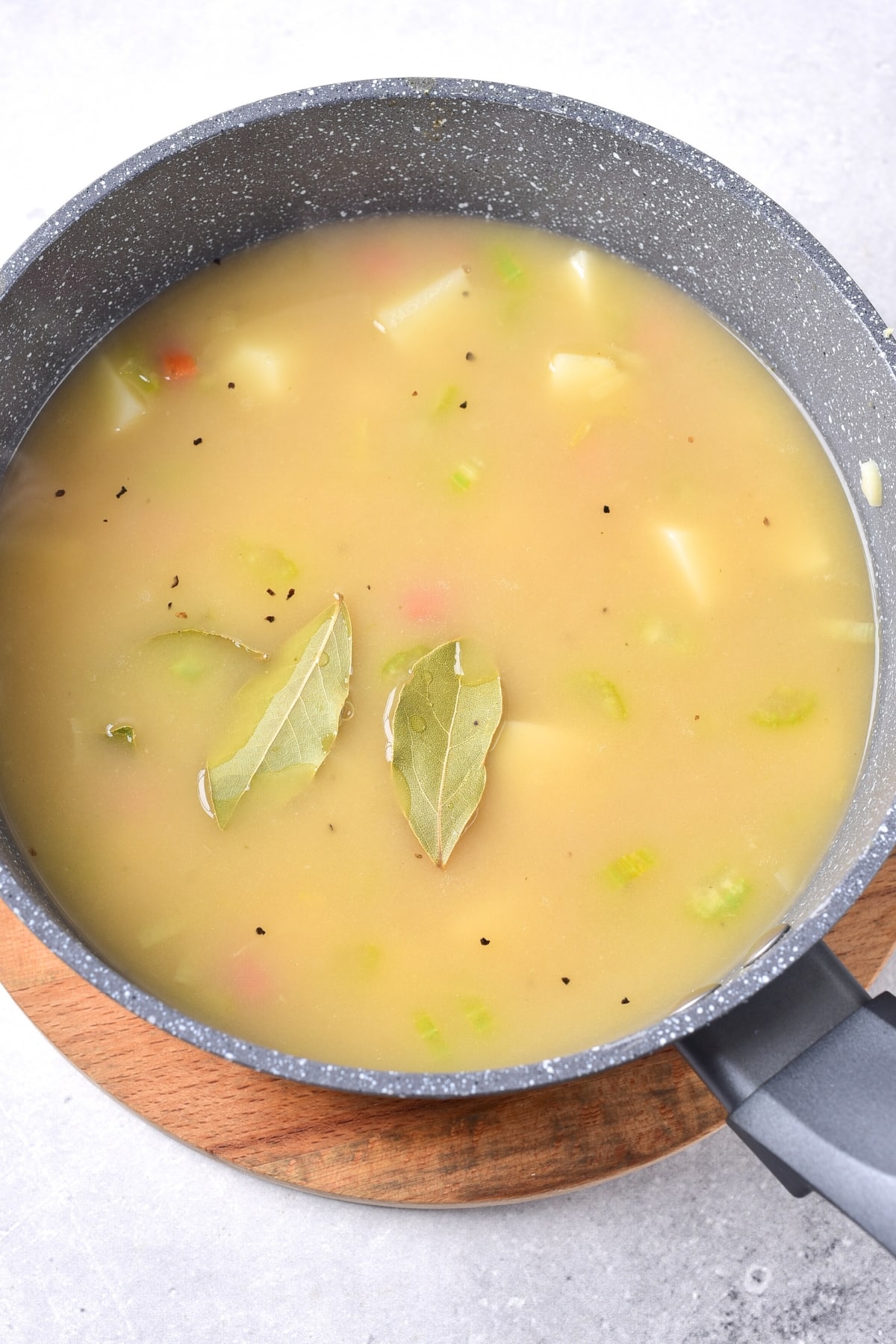 Top down view of soup in a pot