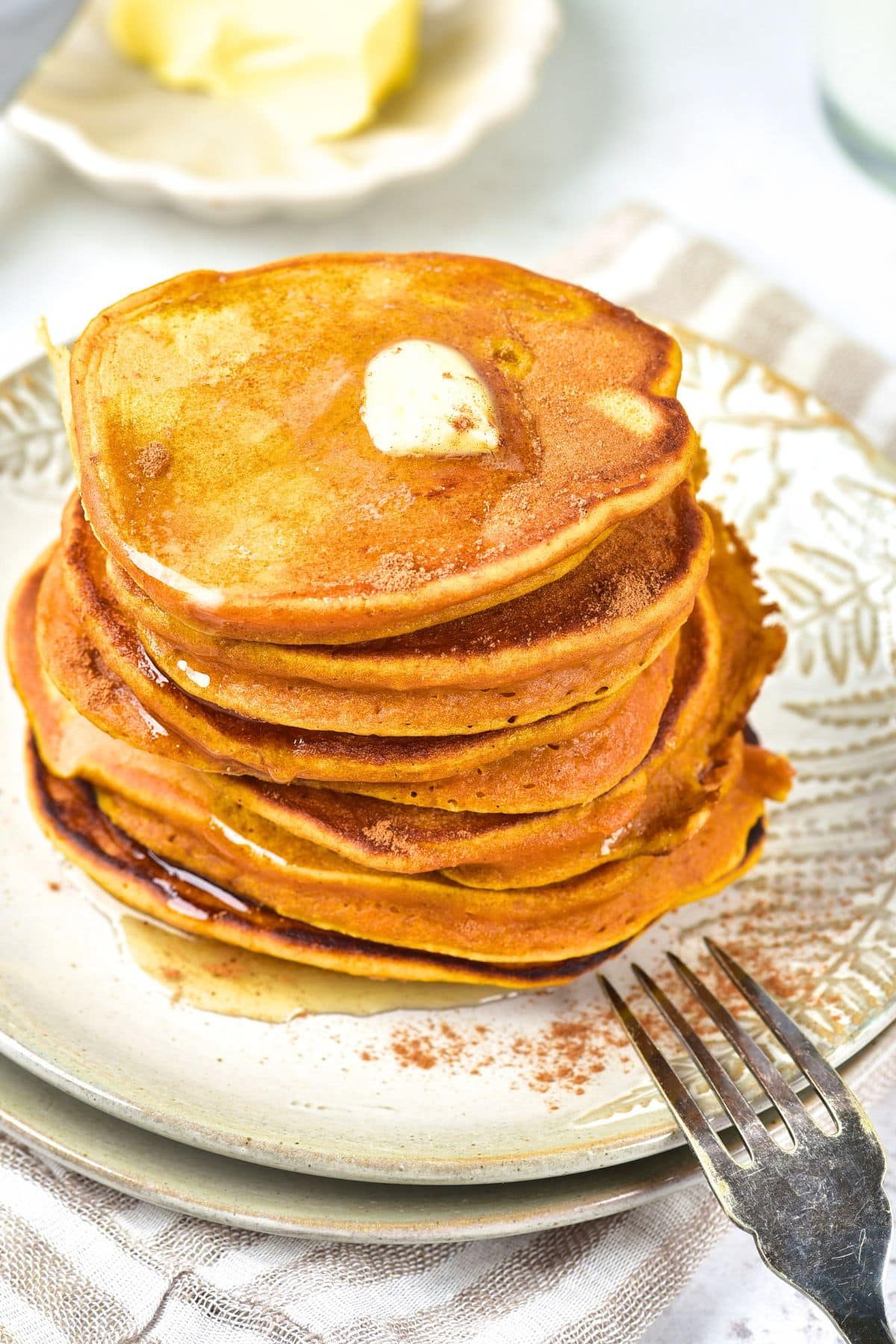 A stack of gluten-free pumpkin pancakes