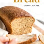 Reaching for a slice of quinoa bread from the board.