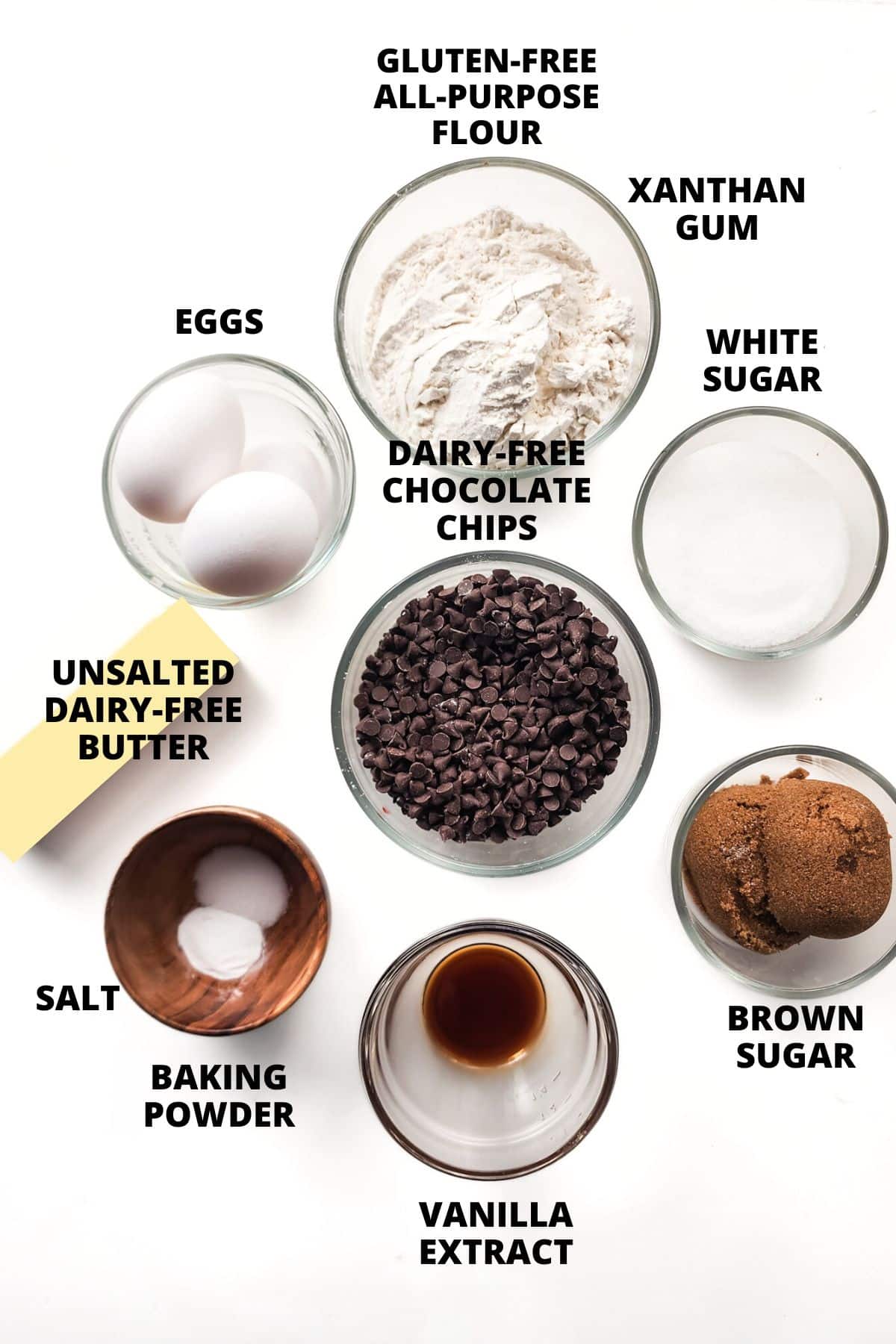 Ingredients for gluten-free skillet cookie recipe laid out on white board.