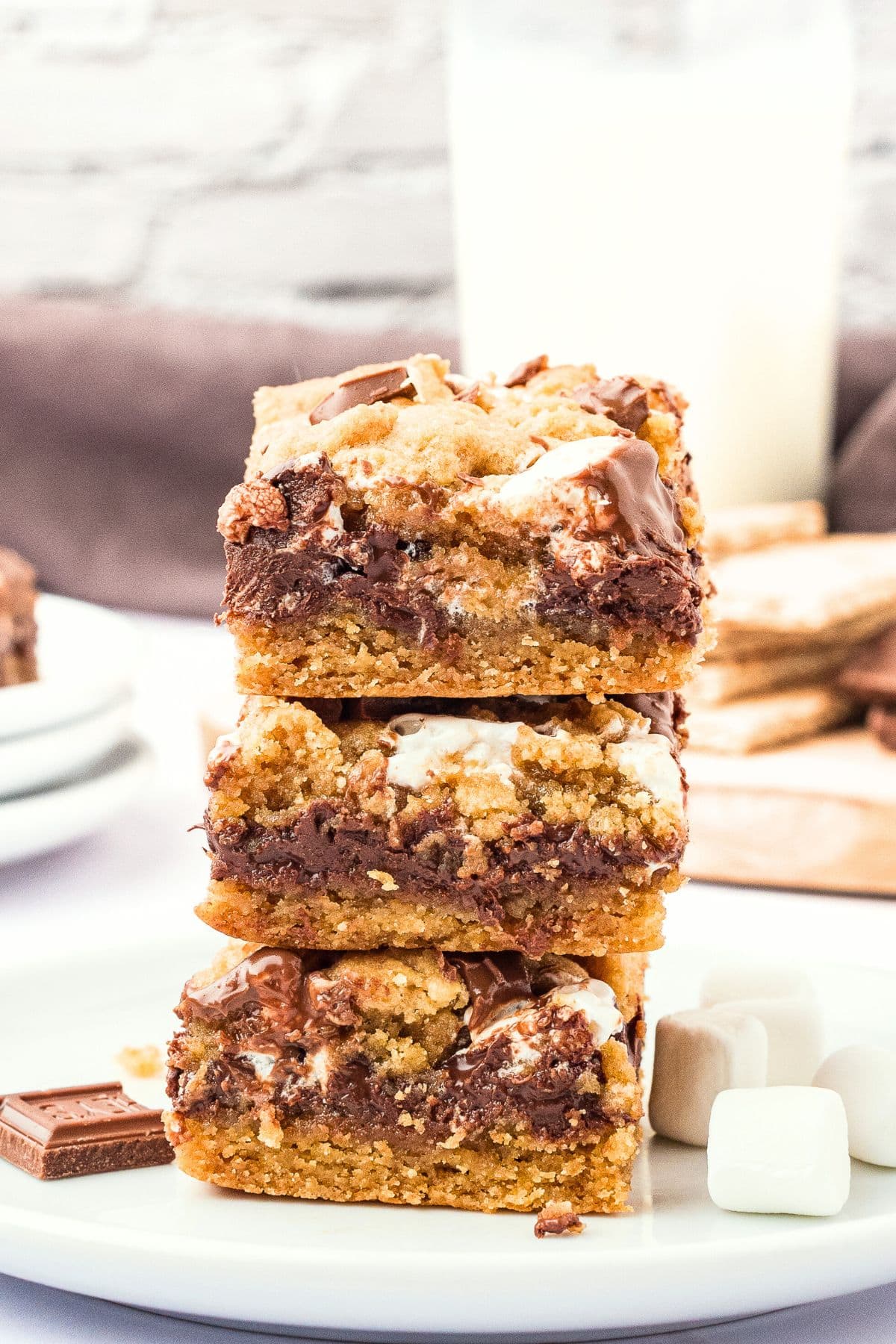 A stack of gluten-free s'mores bars on a plate.