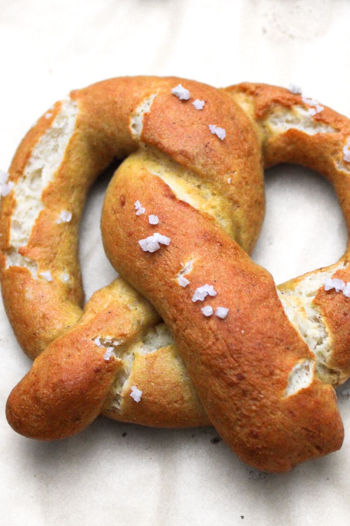Up close view of gluten-free pretzel with coarse salt