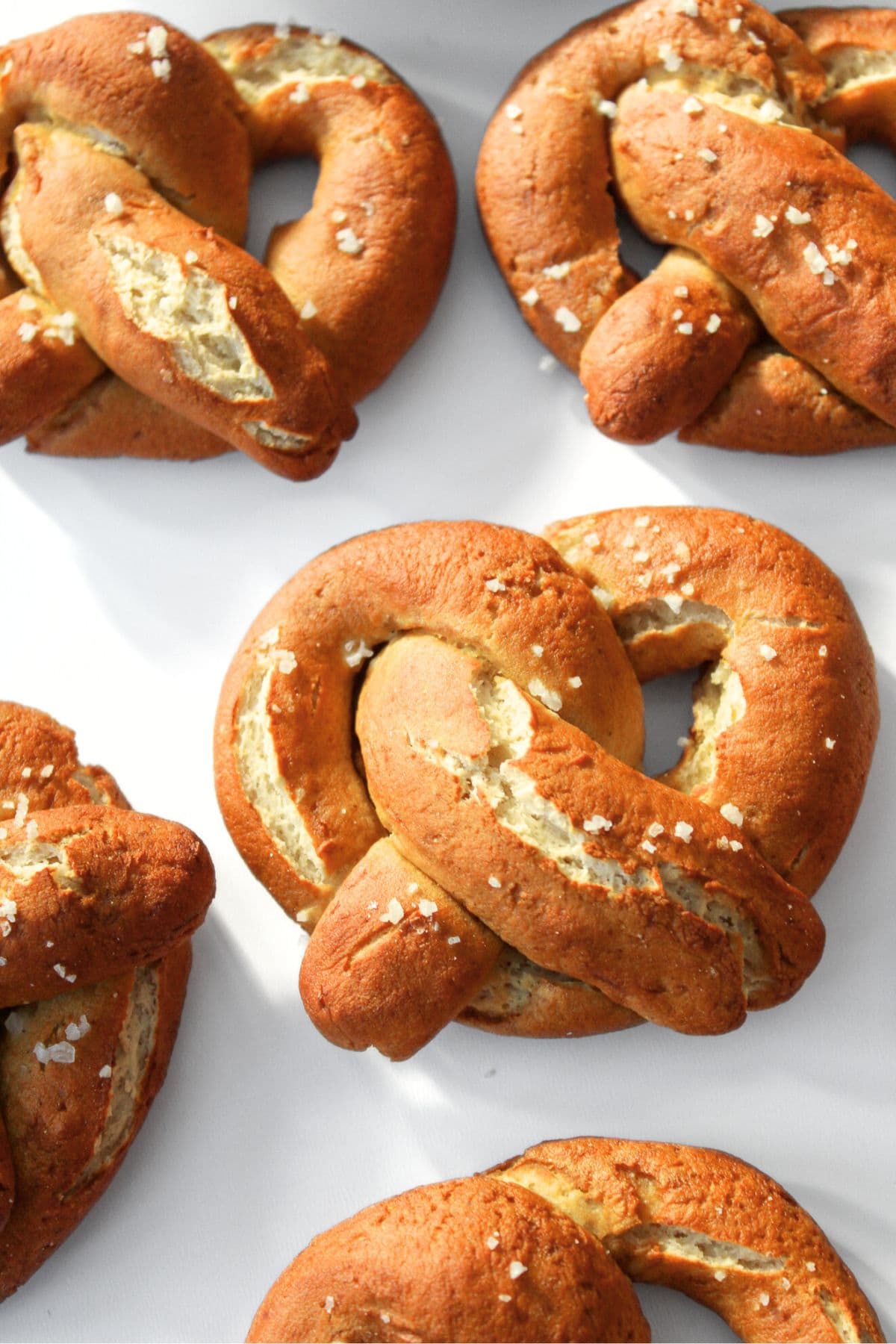 Freshly baked pretzels on parchment