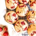 Up close shot of gf strawberry muffins on wire rack.