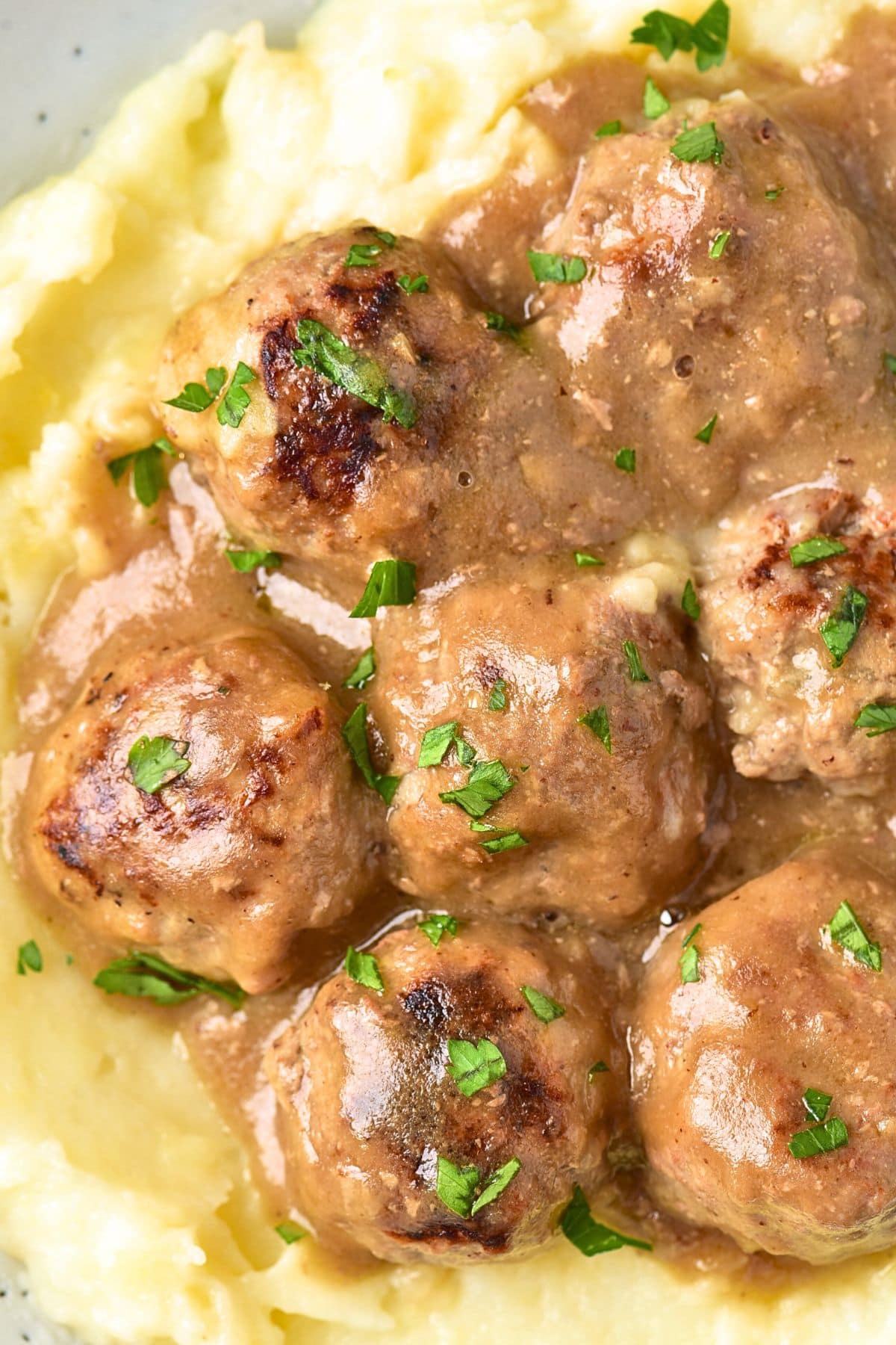 Gluten-free Swedish meatballs over mashed potatoes