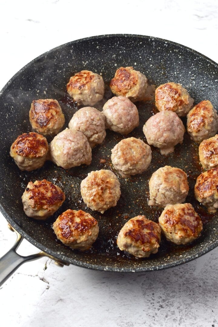 Searing meatballs in skillet