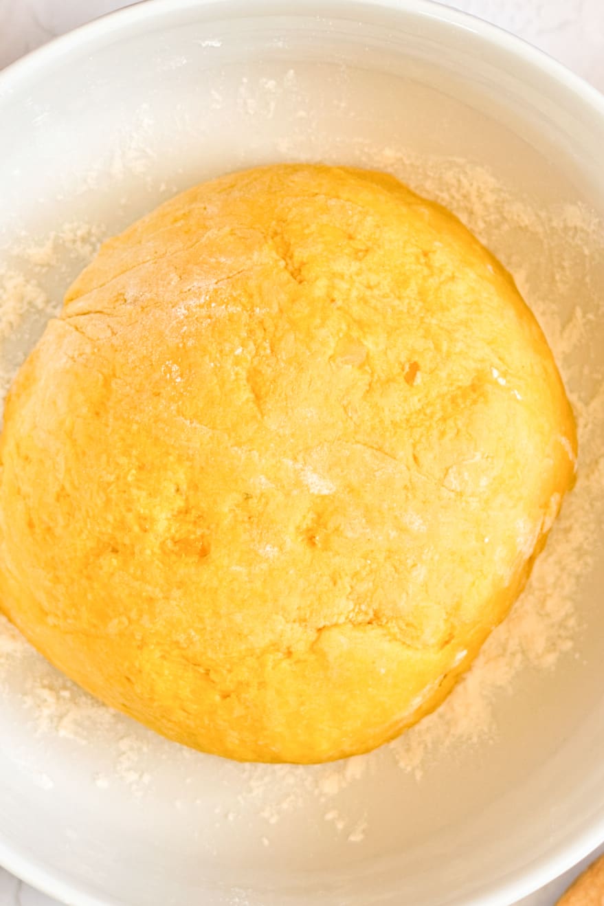 Sweet potato gnocchi dough in a bowl.