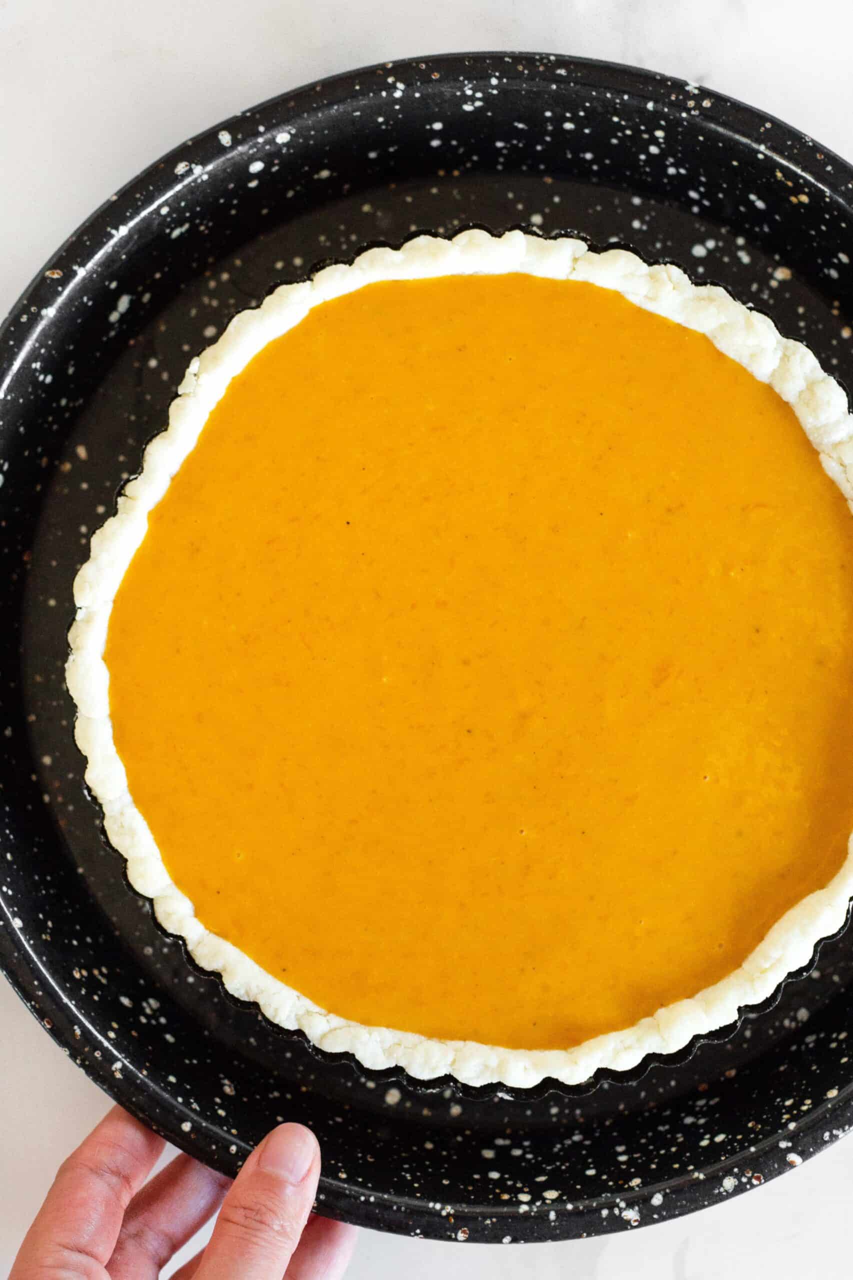 Sweet potato pie ready to be baked.