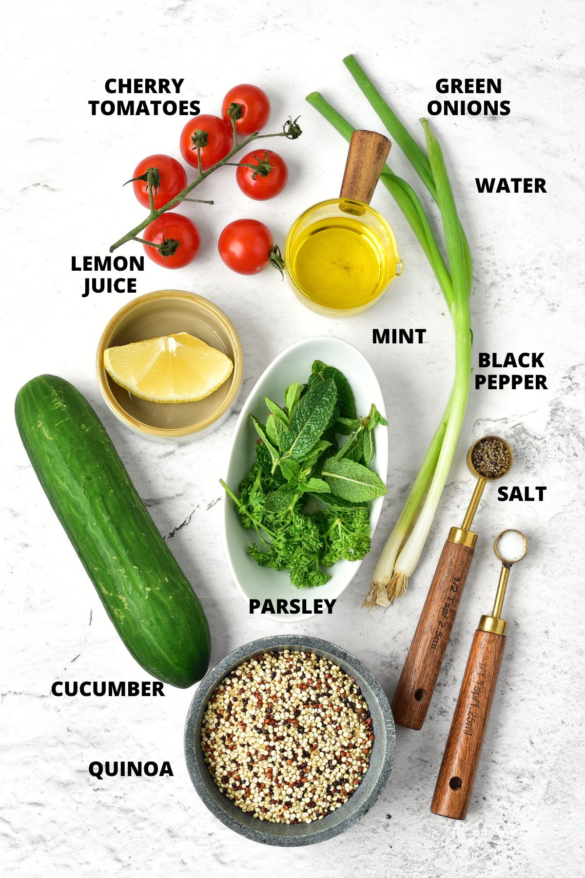 Gluten-Free Tabbouleh Recipe (Quinoa Tabbouleh Salad) Ingredients for gluten-free tabbouleh recipe laid out on marble board.