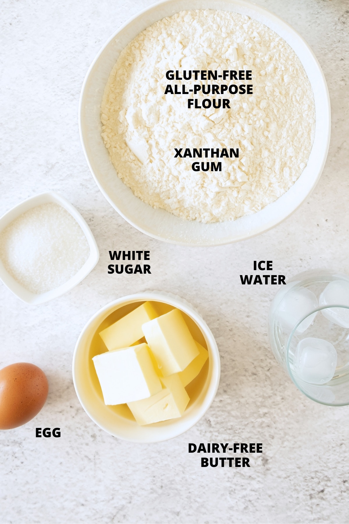 Ingredients for gluten-free tart crust laid out on board.