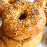 A stack of gluten-free everything bagels