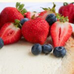 Berries on top of a yogurt cheesecake