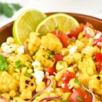 Up close view of a bowl of gluten-free grilled corn salad