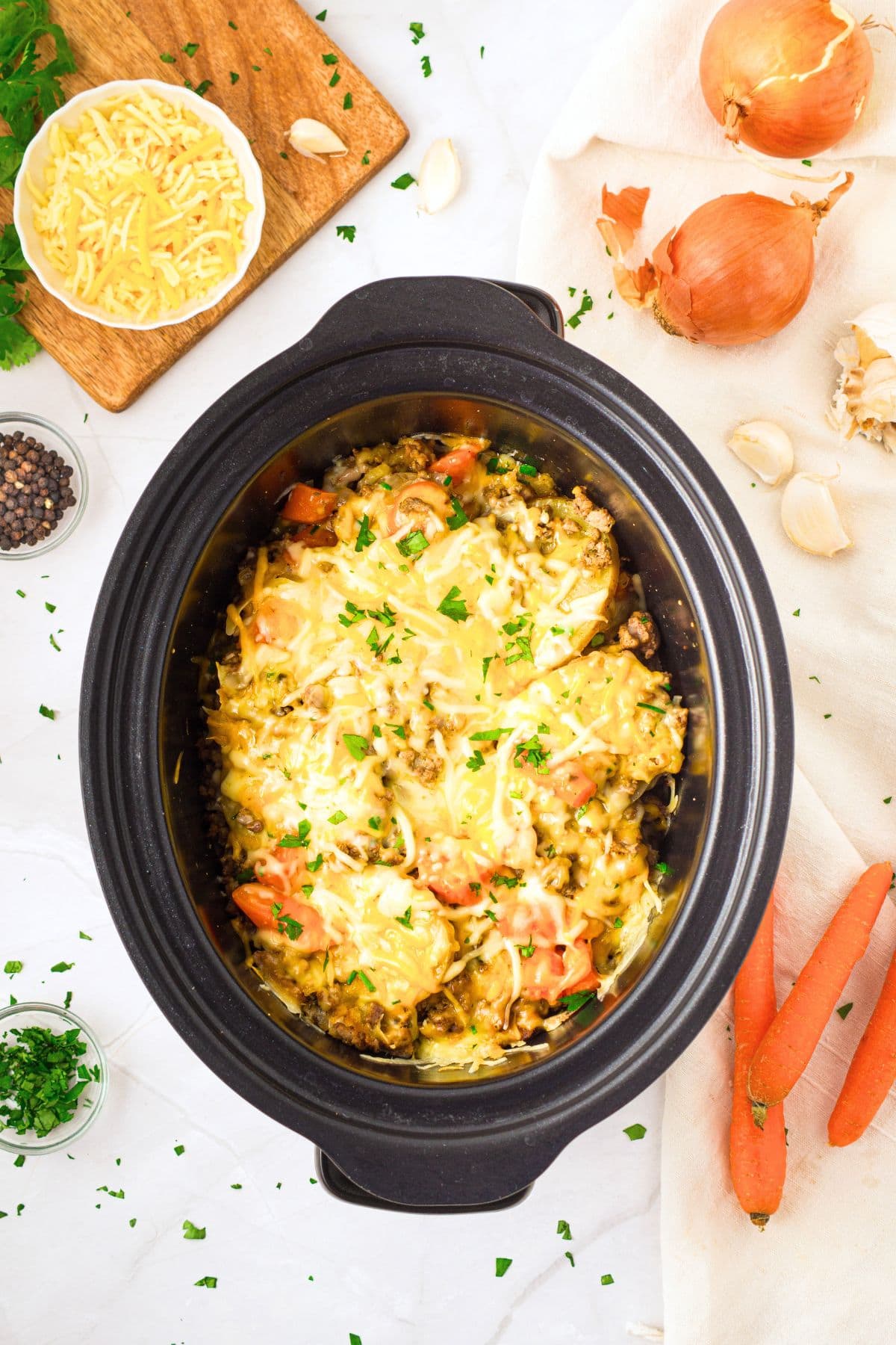 Crockpot Hamburger and Potato Casserole (Gluten-Free, Dairy-Free) Top down view of hamburger and potato casserole in crockpot.