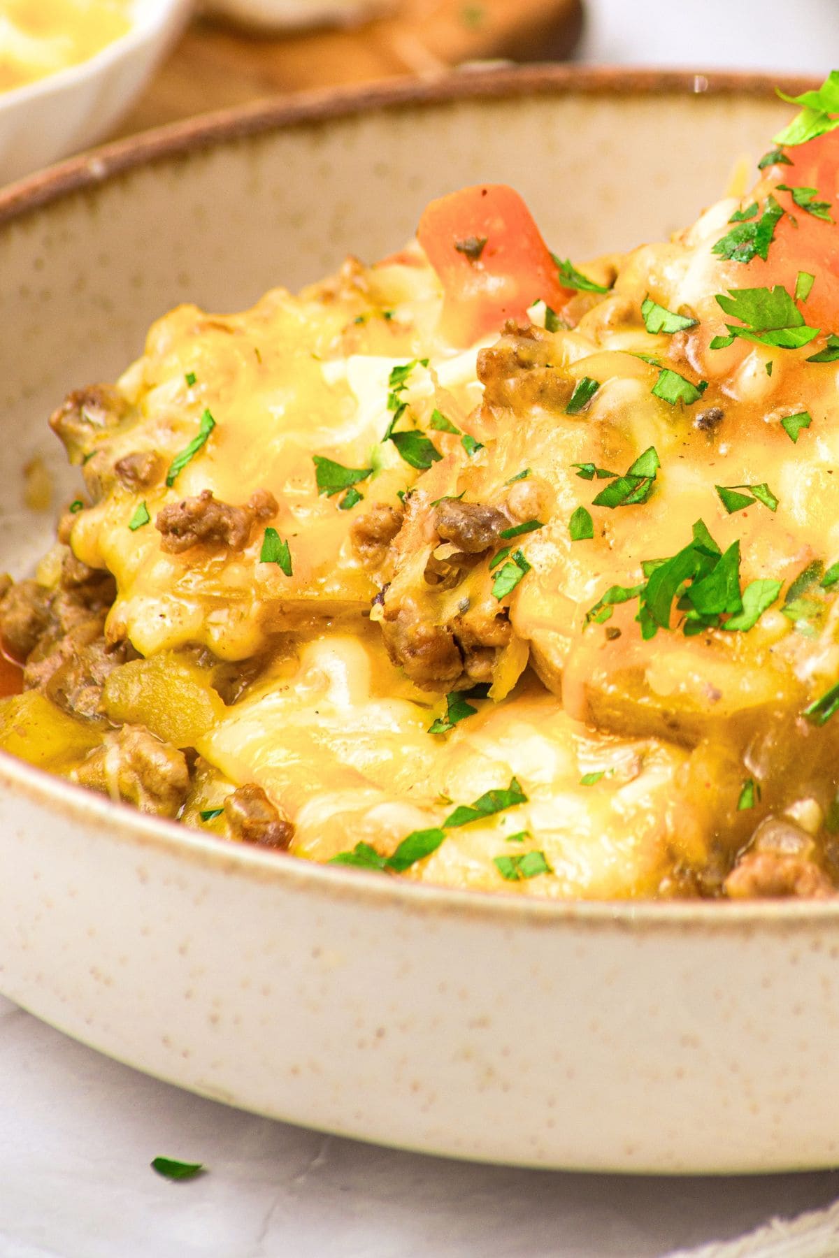 Ground Beef Casserole with Potatoes (Gluten-Free, Dairy-Free) Up close view of a bowl of ground beef casserole with potatoes