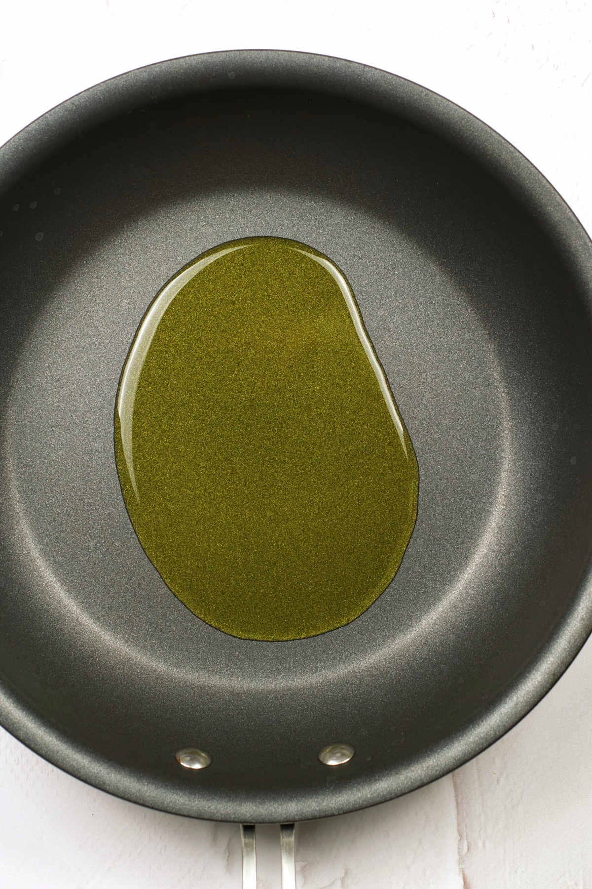 Heating up olive oil in skillet