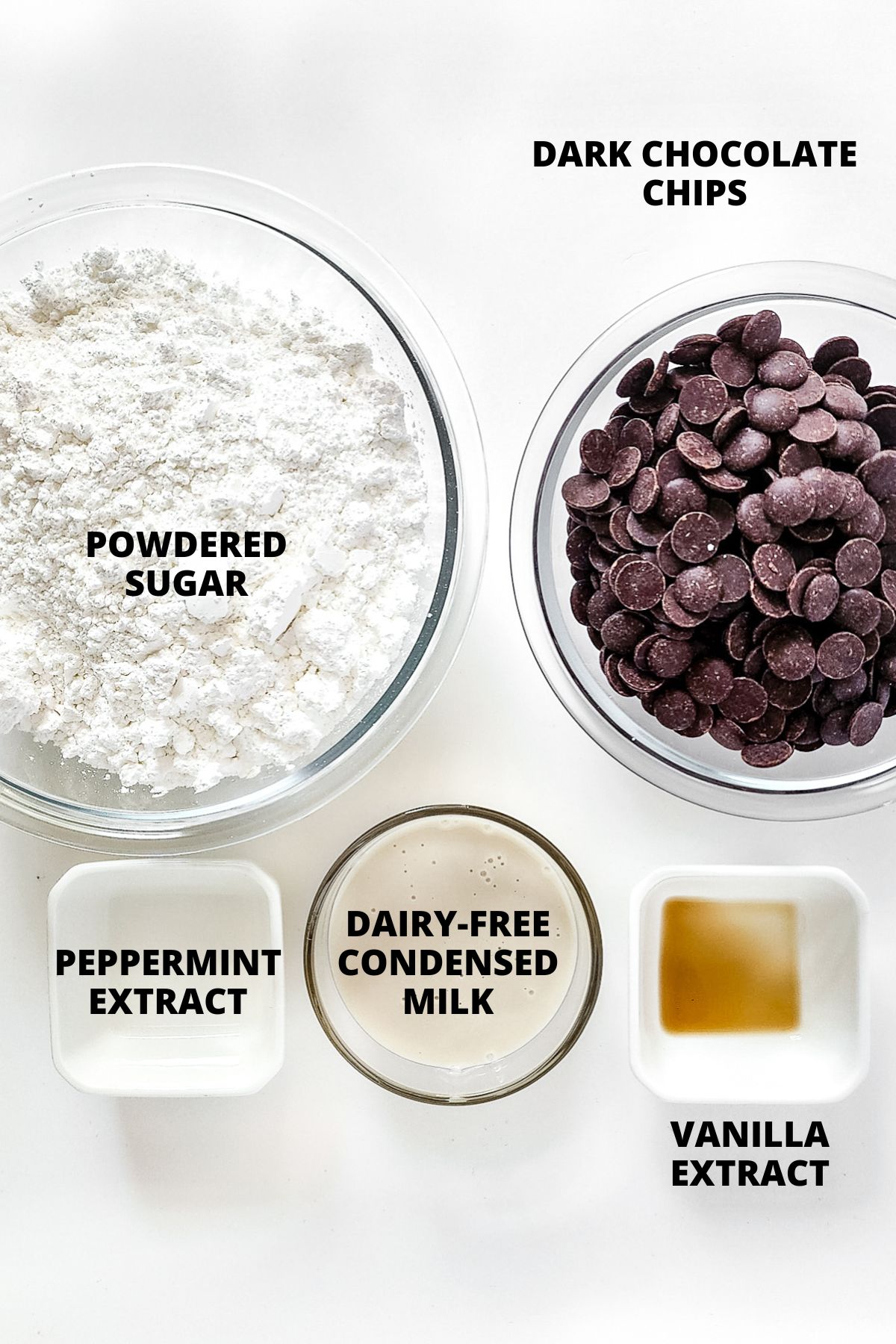 Ingredients for making gluten-free peppermint patties laid out on marble board.