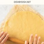 Rolling out tart dough with rolling pin.