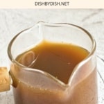 A glass jar of homemade vegan fish sauce.