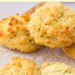 Half-eaten almond flour biscuits on parchment paper