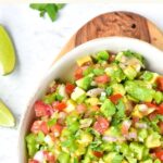 Top down view of a bowl of avocado salsa