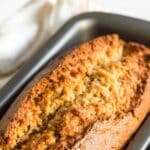 Freshly baked carrot cake bread in pan.