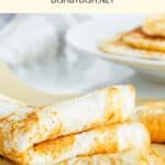 Folded egg white wraps on parchment paper.