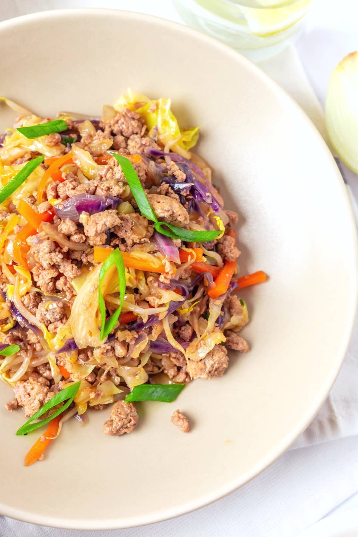 Up close shot of stir fried ground meat and sautéed veggies.