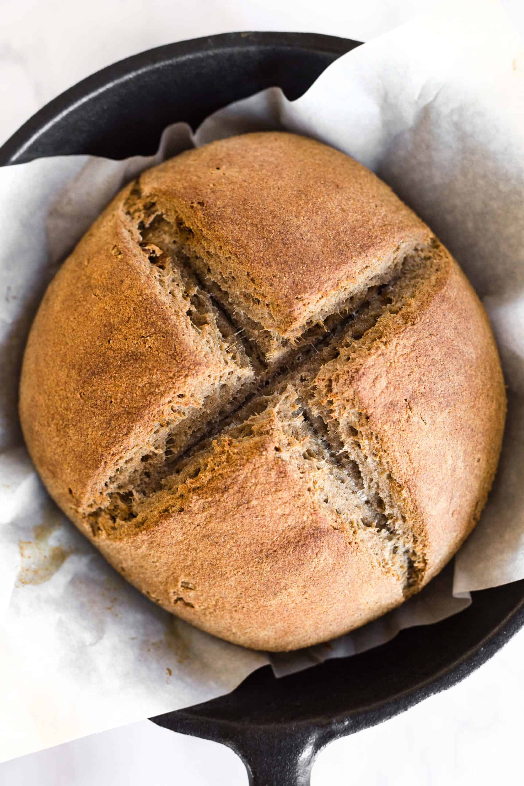 Freshly baked Irish brown bread in cast iron skillet