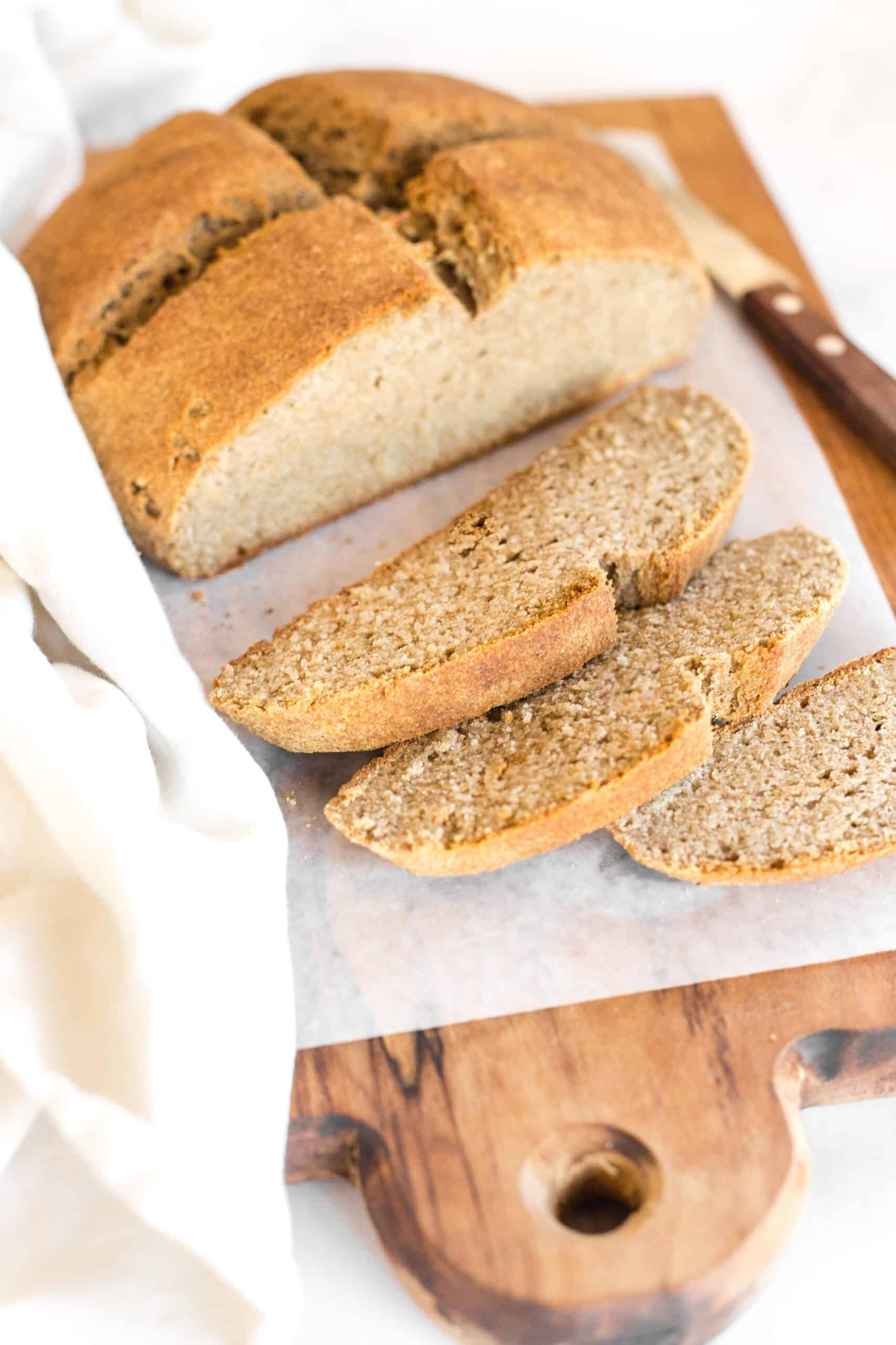 Slices of Irish brown bread on parchment paper.