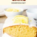 Up close shot of half-sliced gluten-free drizzle cake loaf.