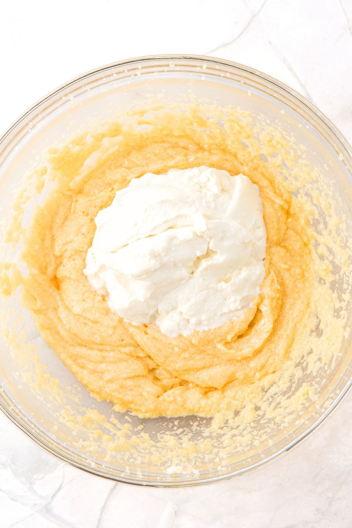 Ricotta cheese on top of cookie dough