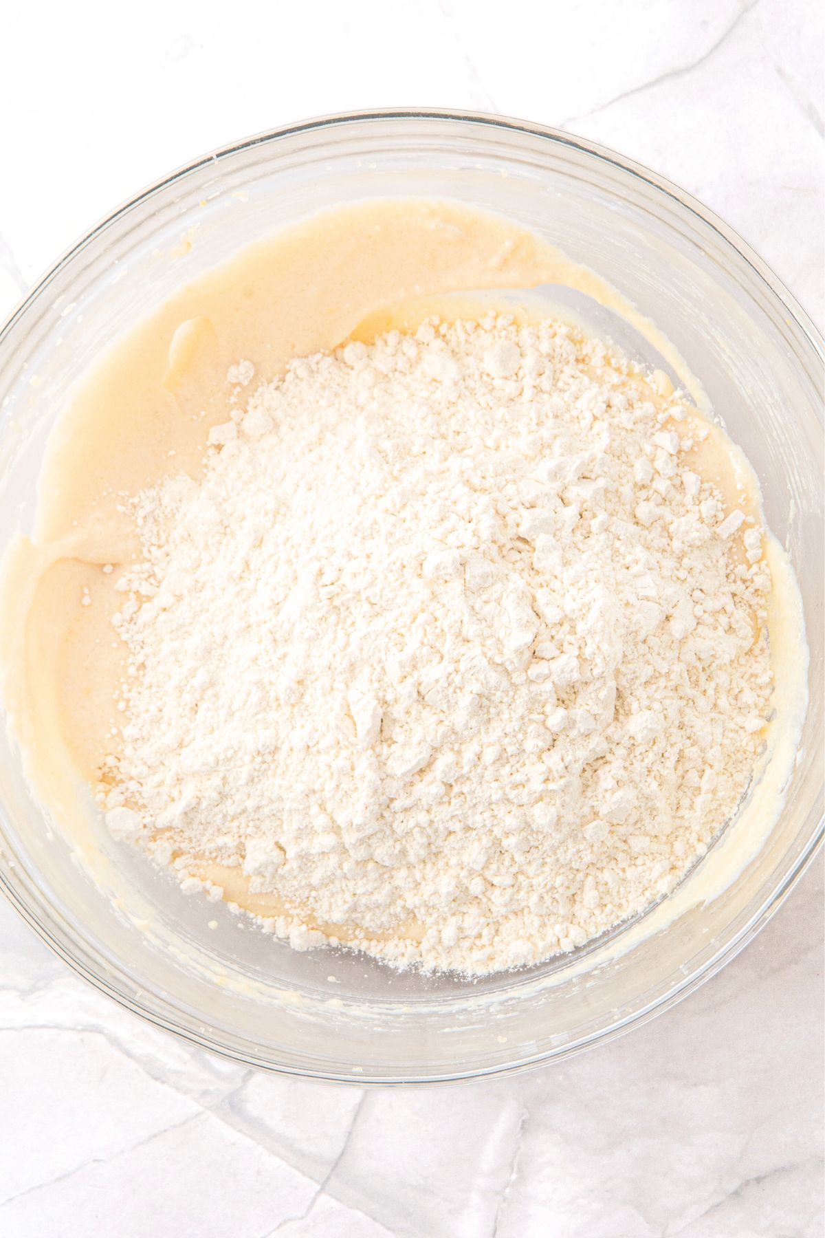 Flour mixture on top of yellow batter