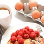 Pancakes and raspberries on a plate