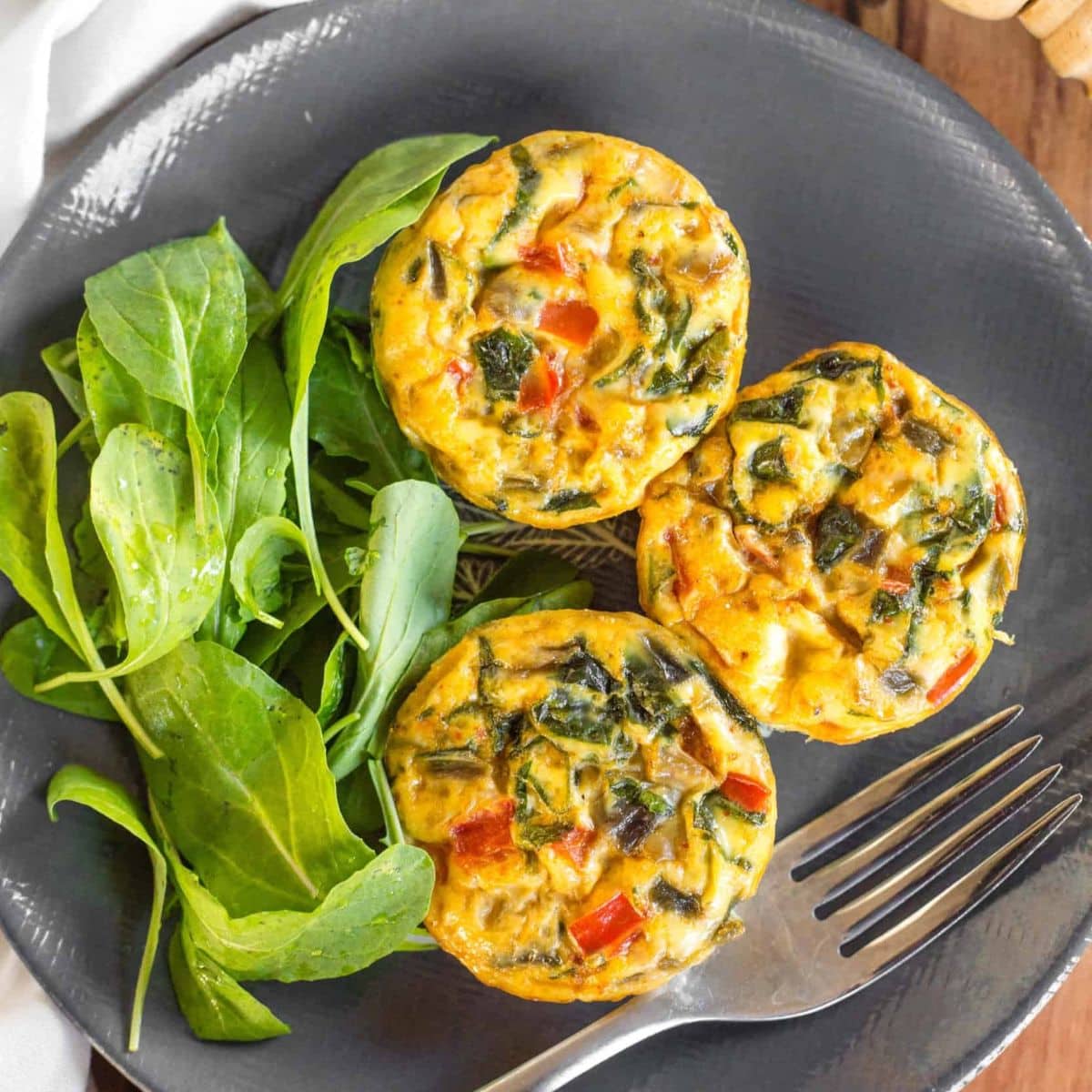 A plate of mini crustless quiche muffins