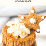 A stack of gingerbread mini cheesecakes with whipped cream