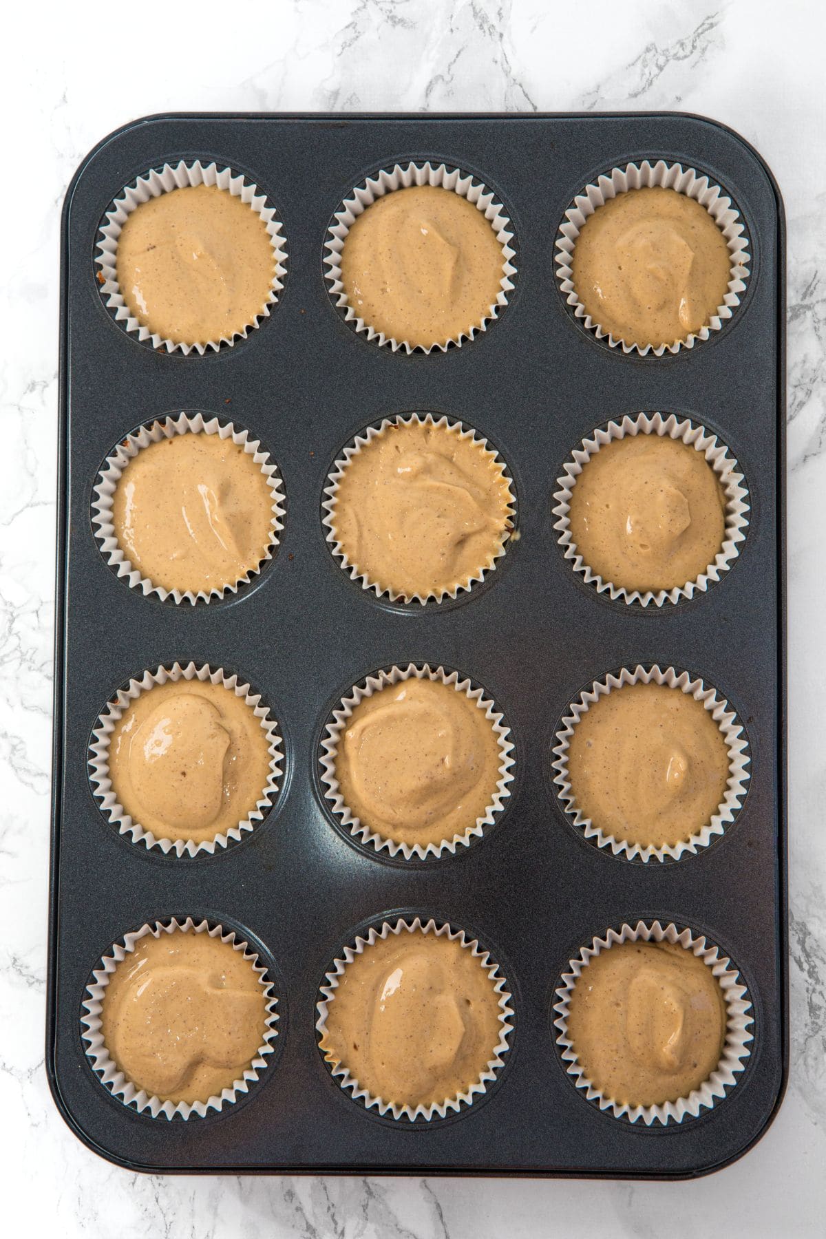 Cheesecake filling in muffin pan