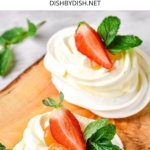 Mini gluten-free pavlova nests topped with strawberries and mint.