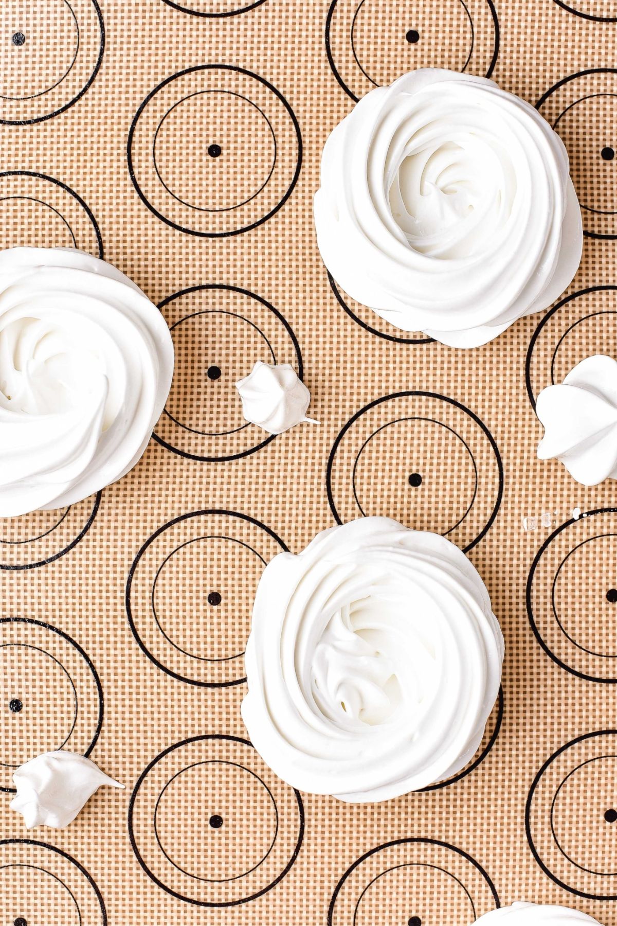 Piped meringue on silpat.