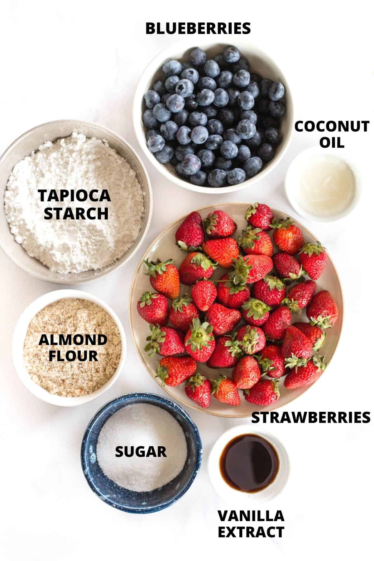Ingredients required for making gluten-free mixed berry crumble.
