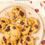Top down view of a plate of cranberry oatmeal cookies