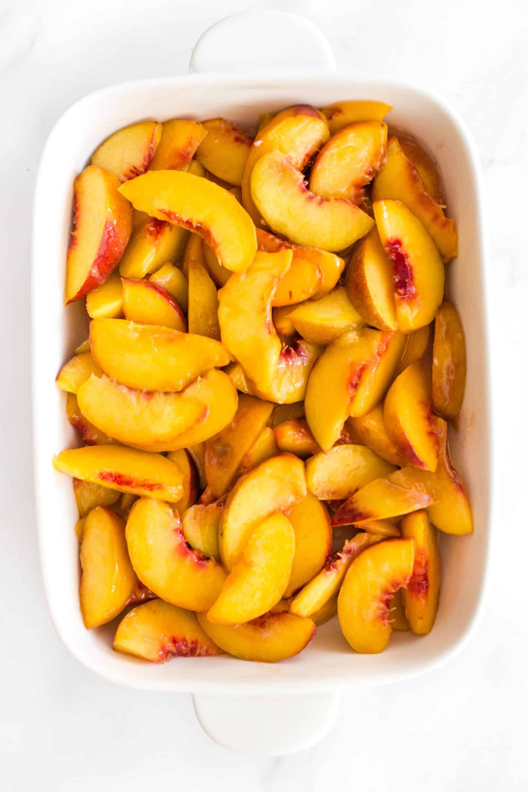 Peach filling in a baking dish.