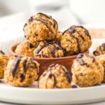 A plate full of peanut butter oatmeal balls